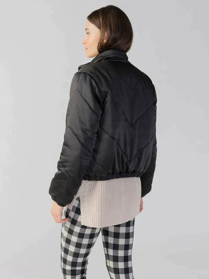 Gesteppte Jacke in Schwarz.